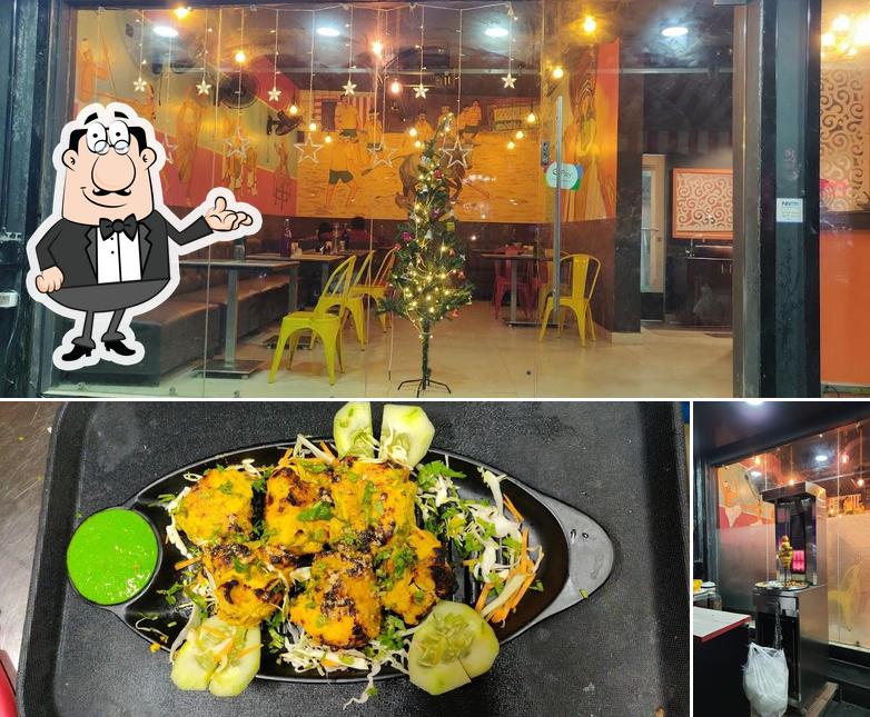 The photo of interior and food at Spicy Biryani