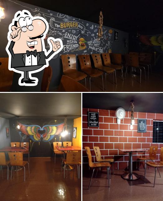 Take a seat at one of the tables at The burger nest