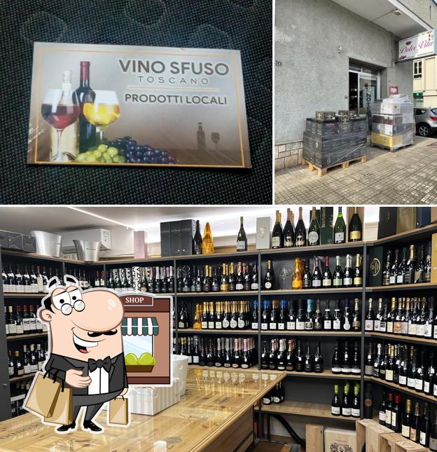 Questa è la immagine che raffigura la esterno e interni di Enoteca Dolce Momento