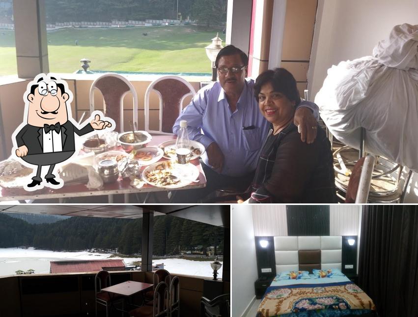 Take a seat at one of the tables at Puri Hotel & Restaurant