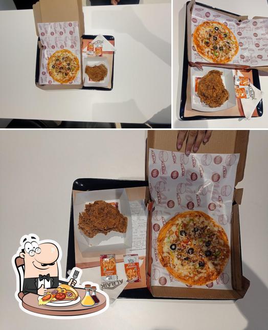 Get pizza at Al Baik