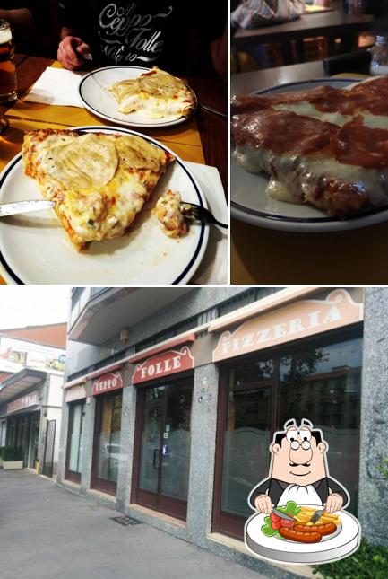 Tra le varie cose da Pizzeria Al Ceppo Folle si possono trovare la cibo e interni
