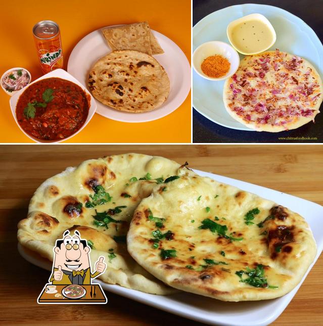 Pick pizza at Anupavi The Family multicuisine Restaurant