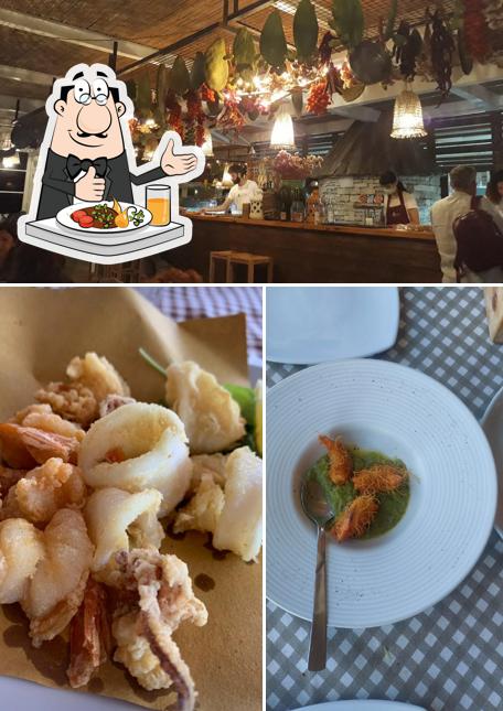 Questa è la immagine che mostra la cibo e bancone da bar di Buen Vivir - Trattoria sul Mare