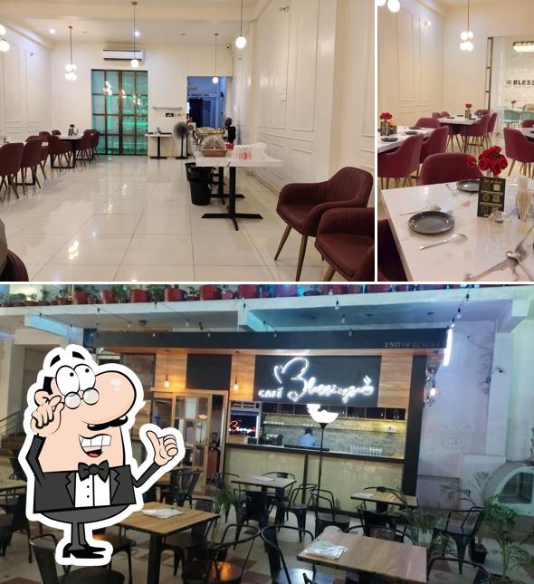 Take a seat at one of the tables at Blessings Hotel Restaurant Deoria ( Banquet, Cafe, Marriage lawn, Private Dine Room)
