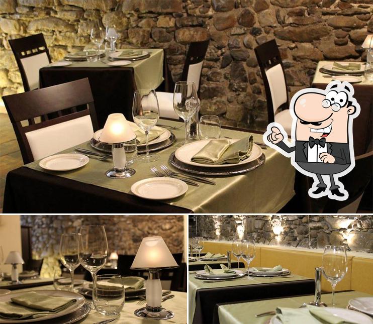 Dai un'occhiata agli interni di Osteria dell'Acqua Dolce