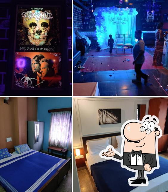 Take a seat at one of the tables at Hotel Big Boss