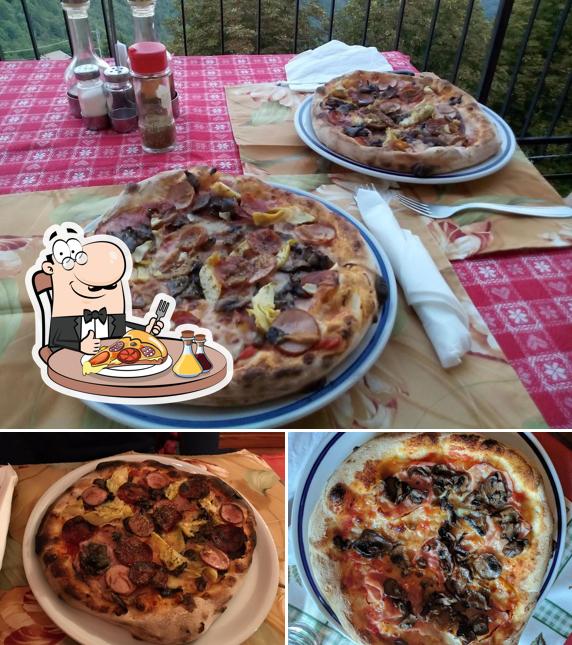 A Pizzeria Dal Baffo Di Dall'Olio Otello, puoi provare una bella pizza