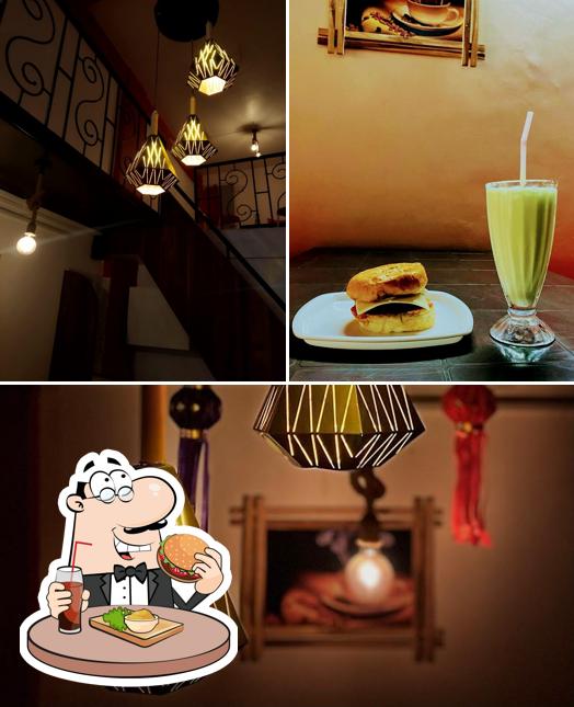 Order a burger at Goodluck Cafe