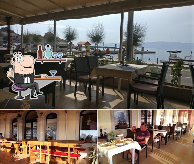 Siediti a un tavolo di Restaurant Uskok