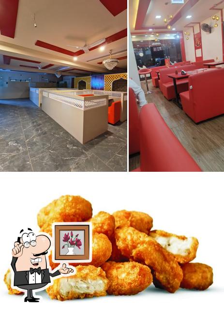 This is the image displaying interior and food at Al-BAIK