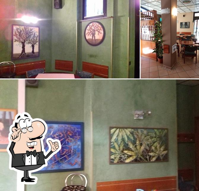 Dai un'occhiata agli interni di Bar Al Solito Posto