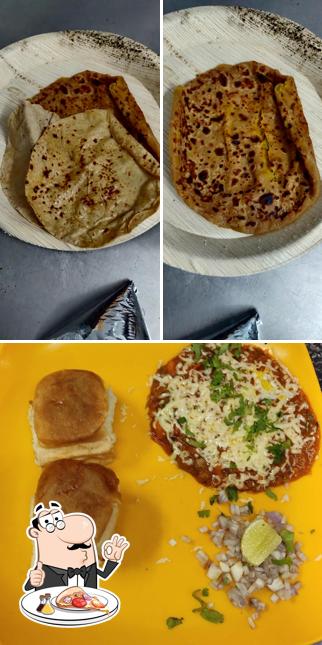Get pizza at Bombay Restaurant