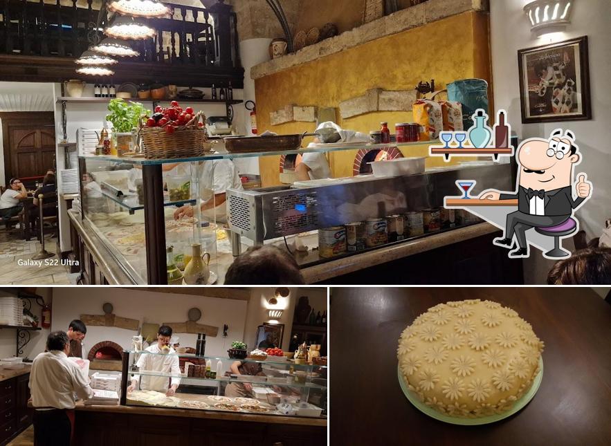 Tra le diverse cose da San Lorenzo Pizzeria Ristò Bar si possono trovare la interni e torta