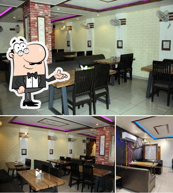 Take a seat at one of the tables at Taj Hotel Restaurant & Family Hall : Best Restaurant / Hotel in Tarn Taran