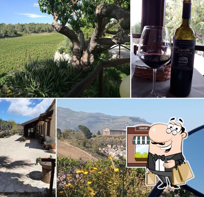 Puoi goderti l'aria fresca da seduto all'esterno di Agriturismo Tenute Pispisa