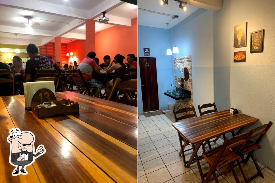 Veja imagens do interior do Pizzaria e Esfiharia Brasileira