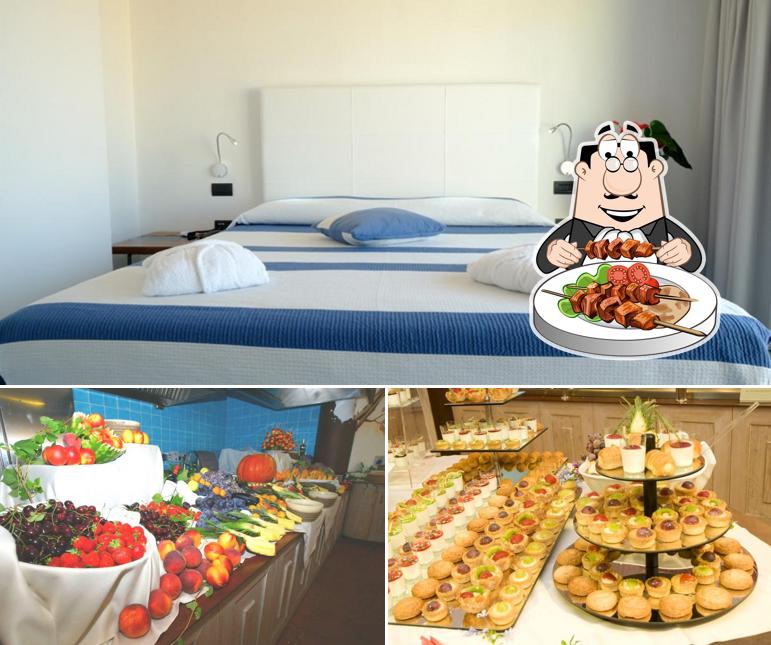 Tra le diverse cose da BAIA CADDINAS Hotel Resort & SPA si possono trovare la cibo e interni