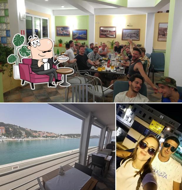 Dai un'occhiata agli interni di Pizzeria Martin