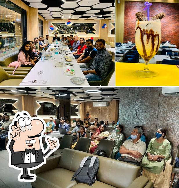 Take a look at the image depicting interior and beverage at Green Leaf Restaurant