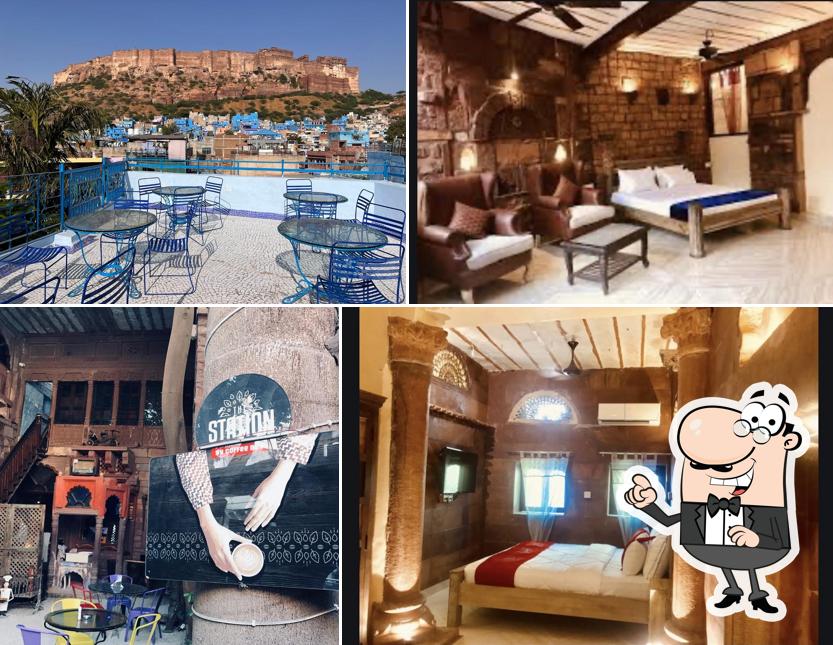 Take a seat at one of the tables at JHANKAR HAVELI