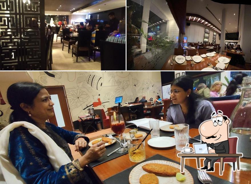 Take a seat at one of the tables at Mainland China New Delhi