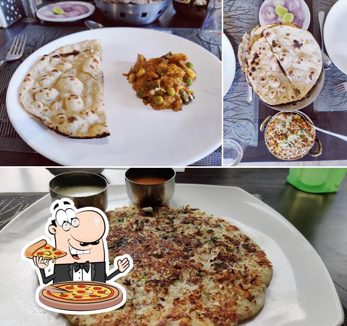 Pick pizza at Swadishta Restaurant ( CRYSTAL INN) STAY & DINE-Vegetarian Hotel In Chickmagalur