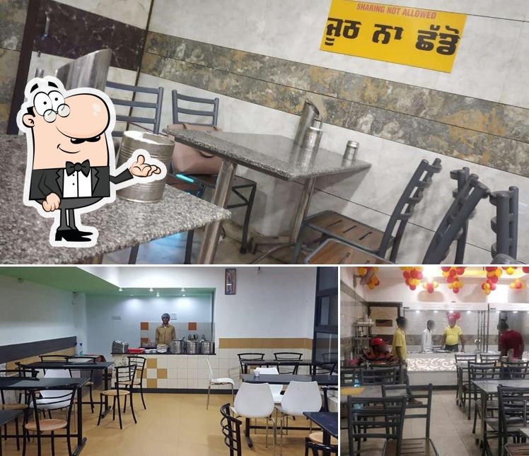 Take a seat at one of the tables at Bhena Da Dhaba