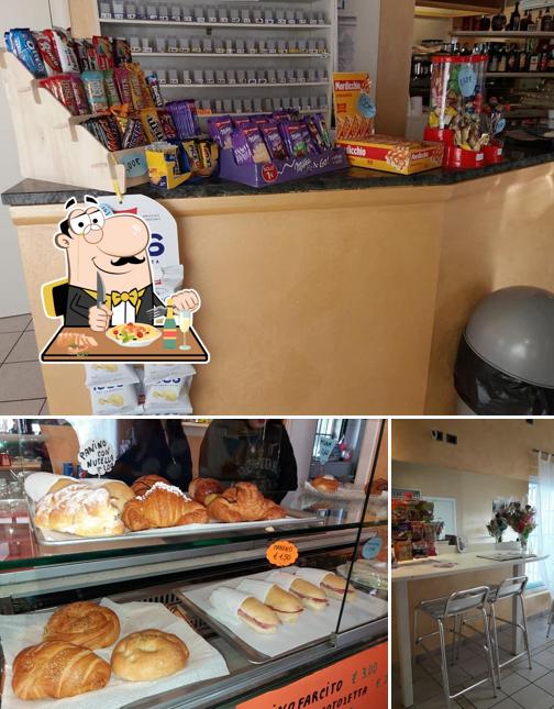 Questa è la immagine che presenta la cibo e interni di Bar cogli l'attimo
