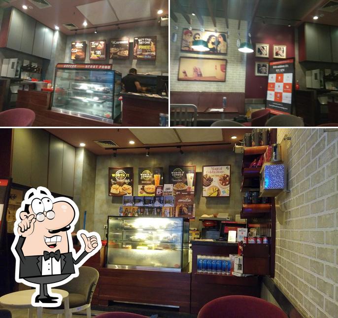 Check out how Café Coffee Day - Ramakrishna Ashram Marg looks inside