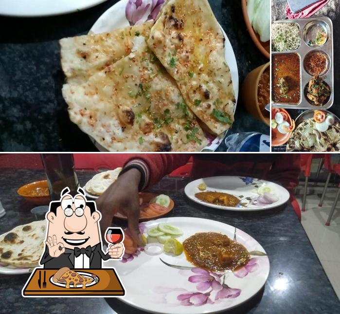 Pick pizza at HOTEL RAJNANDINI