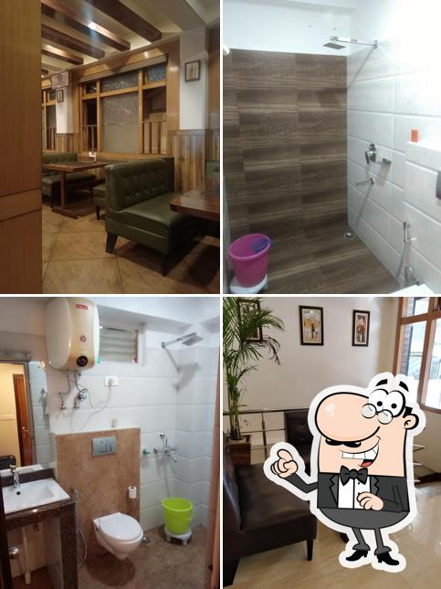 Take a seat at one of the tables at HOTEL SHER-E-PUNJAB & (Family Restaurant & Bar)