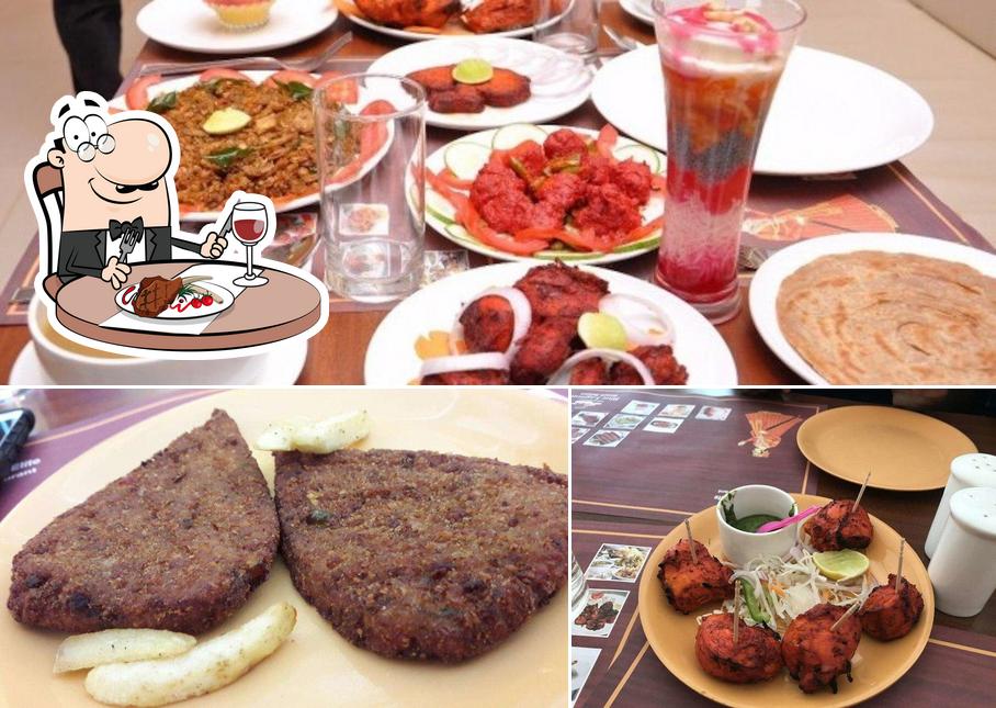 Order meat dishes at Buhari's Blue Lagoon