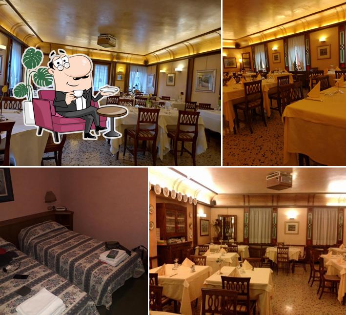 Siediti a un tavolo di Hotel Ristorante Alpi - Foza