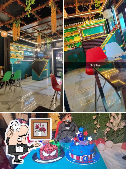 Take a look at the image depicting interior and food at Food Paradise