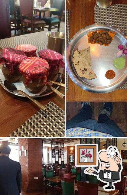 Take a seat at one of the tables at Pind Balluchi