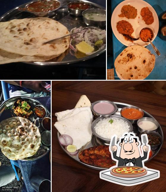 Order pizza at Hotel Suvarna