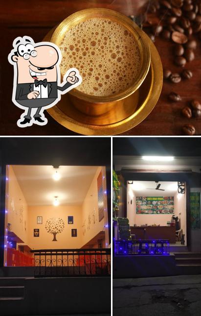 The image of interior and beverage at South Indian Upahar