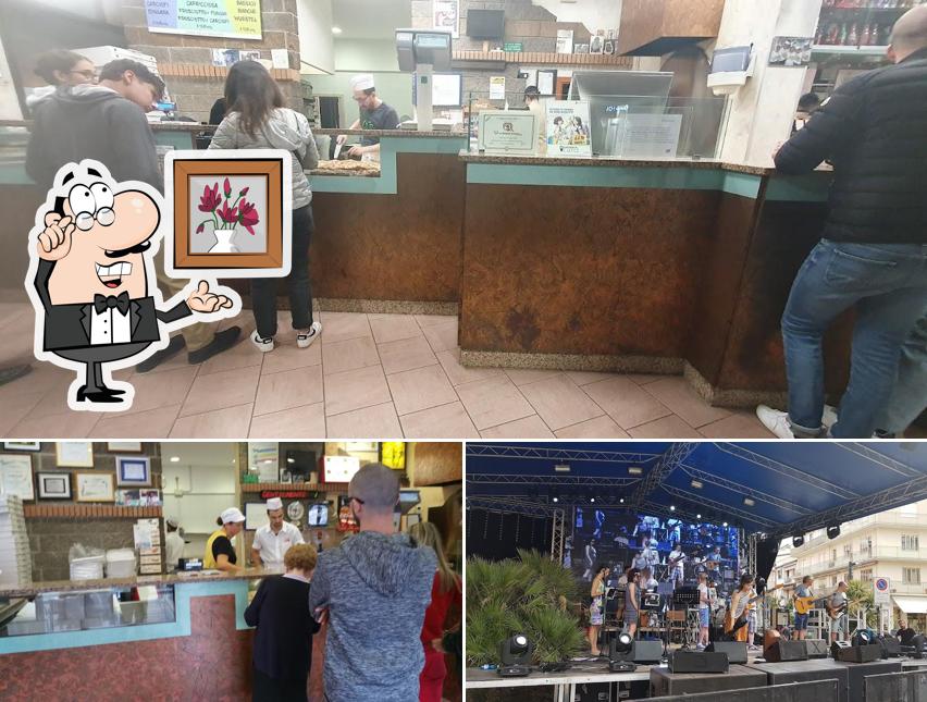 Dai un'occhiata agli interni di Pizzeria Da Leo