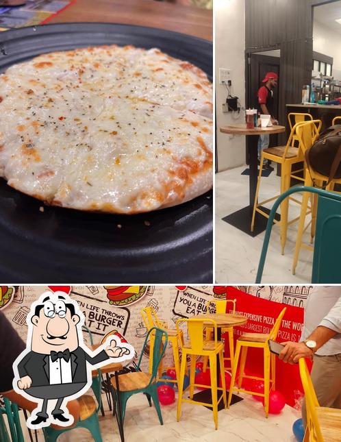 This is the picture showing interior and meat at Laziz Pizza