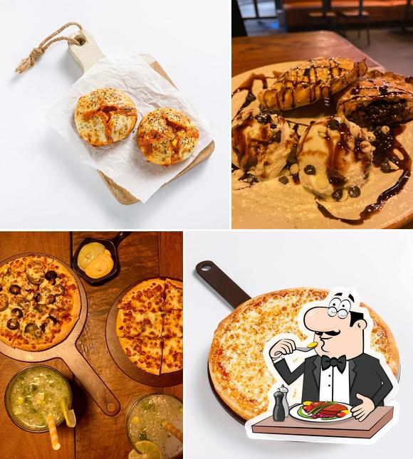 Tossin Pizza Dwarka Best Pizza in Delhi