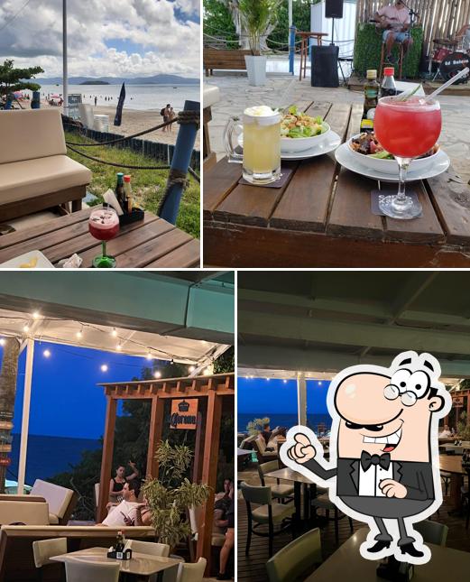 Sente em uma das mesas no Santo Lua Restobar - Florianópolis