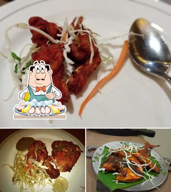 Order different seafood items served at Satkar Family Restaurant & Bar