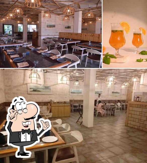 The picture of Pathikashram - Class 43 Multi Cuisine Restaurant’s interior and food