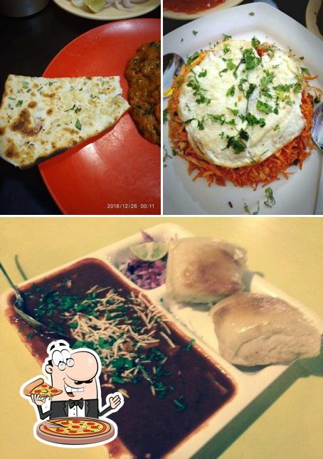 Try out pizza at Hotel Sadguru