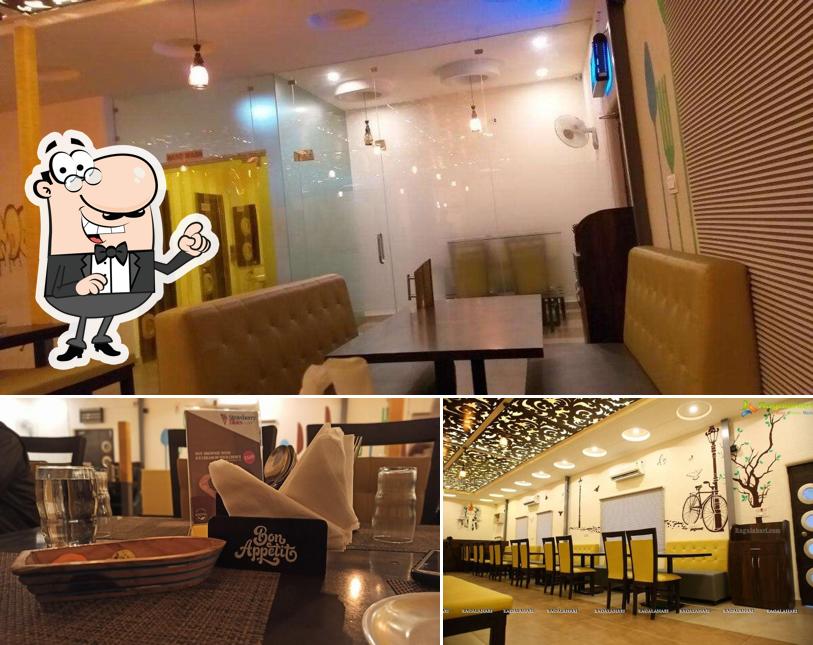 Take a seat at one of the tables at Fullmoon Multicuisine Family Restaurant