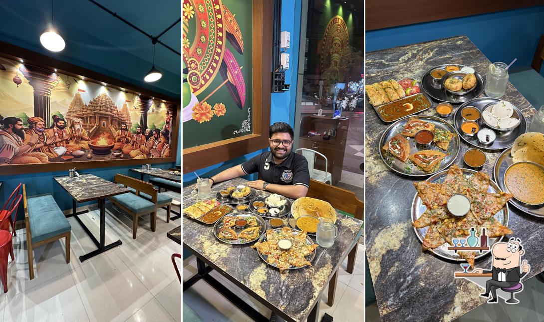 Take a seat at one of the tables at Umiya Dosa & Bhaji pav