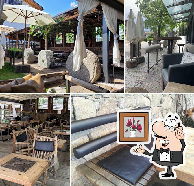 Dai un'occhiata agli interni di Gartencafè Tonig Bar