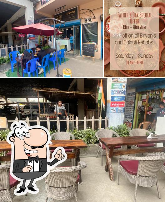 Take a seat at one of the tables at LUCKNOW NAWABS & KEBABS