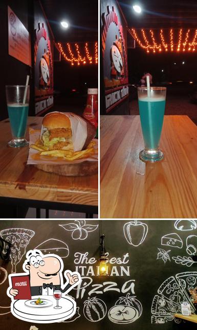 Check out the photo showing food and exterior at Brick Oven